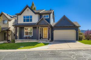 a house with a garage in front of it at 5410 Cross Country Mountain Ski Getaway with Hot Tub & Pool! home in Park City