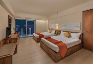 Voodi või voodid majutusasutuse Pico Sands Hotel toas