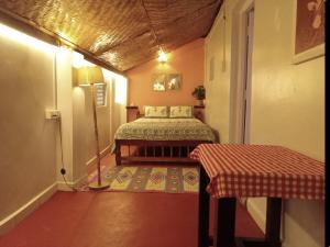 Ένα ή περισσότερα κρεβάτια σε δωμάτιο στο 2BHK AC GOAN Beach House - Patnem Colomb