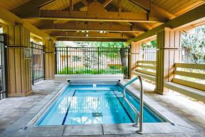 an indoor swimming pool in a house with a roof at Sunburst Condo 2786 in Sun Valley