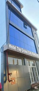 a hotel the grand elite runaway with a sign on it at Hotel The Grand Elite Ramayan - Near Ram Mandir in Ayodhya