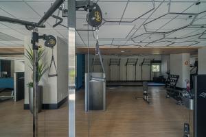 Pusat kecergasan dan/atau kemudahan kecergasan di Sunset Rooftop Studio - Brooklin Deslumbrante +45 gambar