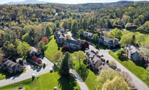 an aerial view of a home in a subdivision with trees at Chetola: Camelia 2 in Blowing Rock