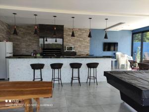 Η κουζίνα ή μικρή κουζίνα στο ResidencialCollins casa 788