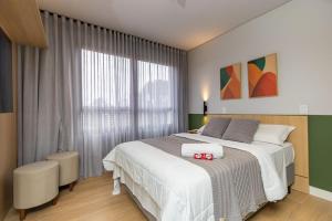 Postel nebo postele na pokoji v ubytování Studio Super Completo em Região Tranquila -EIX0402 + 66 fotografií