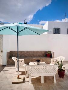 Khu vực ghế ngồi tại À côté du parc saada la marsa