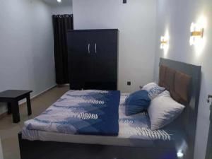 Krevet ili kreveti u jedinici u okviru objekta Divine Villa and Resort Guest House PLOT 35 Umuezeukwu Road, Oboro, Ikwuano LGA,Abia State
