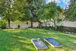 two ping pong tables in the grass in a yard at The BYU Fan Club - Close to BYU - Family Retreat in Lindon