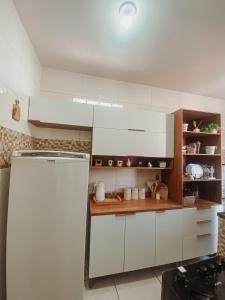 Η κουζίνα ή μικρή κουζίνα στο Raízes Guest House +12 φωτογραφίες