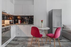 Kuchyň nebo kuchyňský kout v ubytování Home Guest - Apartment 12