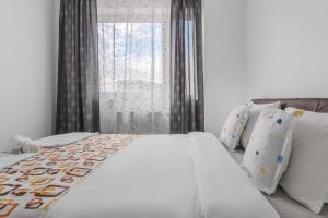 Postel nebo postele na pokoji v ubytování Home Guest - Apartment 12