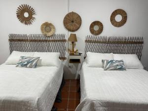 Ένα ή περισσότερα κρεβάτια σε δωμάτιο στο Lali Beach Hotel Boutique