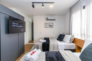 Et tv og/eller underholdning på Studio com 2 camas de casal e garagem - EIX0805