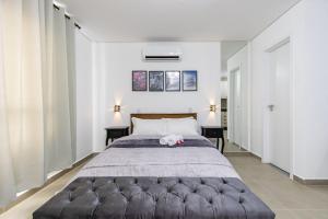 Postel nebo postele na pokoji v ubytování Studio Completo com Cama Auxiliar e Vaga - EIX0808