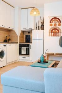 Η κουζίνα ή μικρή κουζίνα στο Studio Apartment City Dream