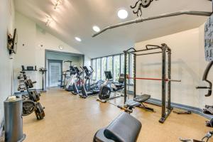 a gym with several treadmills and cardio machines at Poolside Fun + Oceanfront Bliss: Kure Beach Haven! in Kure Beach