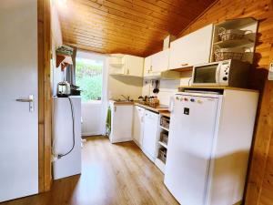Η κουζίνα ή μικρή κουζίνα στο Chalet Cozy - Clim - Vue Pyrénées +1 φωτογραφίες