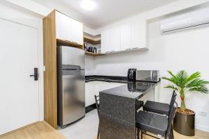 Η κουζίνα ή μικρή κουζίνα στο Apartamento de 2q em Prédio com Piscina - IBI0701 +103 φωτογραφίες