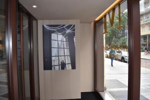 a hallway with a picture of a building at Garibaldi Palace in Milan