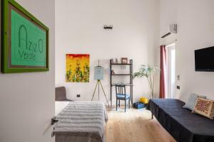 TV a/nebo společenská místnost v ubytování Azizò, la Verde