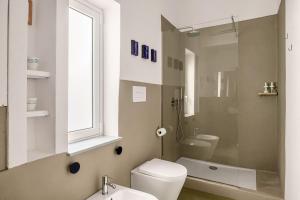 Koupelna v ubytování Azizò, la Verde