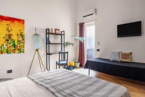 Postel nebo postele na pokoji v ubytování Azizò, la Verde