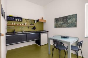 Kuchyň nebo kuchyňský kout v ubytování Azizò, la Verde