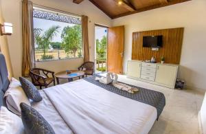 TV a/nebo společenská místnost v ubytování Corbett Jungle Breeze