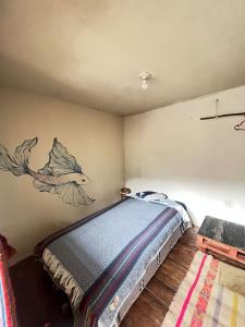 Postel nebo postele na pokoji v ubytování Fuego Nomada hause + 4 fotografie