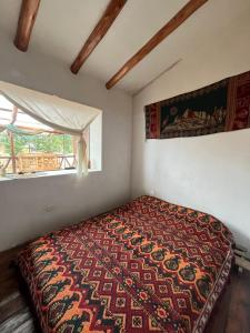 Postel nebo postele na pokoji v ubytování Fuego Nomada hause