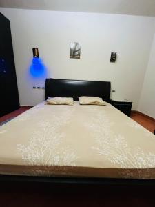 Ένα ή περισσότερα κρεβάτια σε δωμάτιο στο Porto Sokhna pyramids Family +7 φωτογραφίες