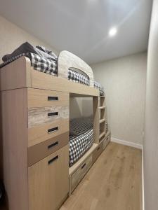 En eller flere senge i et værelse på GAVIA- Suite LUXURY - Go easy Down town