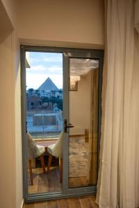 Imagen de la galería de La Pyramids otel, en El Cairo
