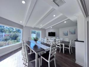 a dining room with a table and chairs at Destination #01 in Anaheim