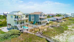an aerial view of a house on the beach at Sea La Vie in Indian Beach