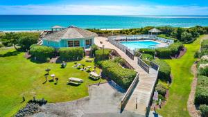 an aerial view of a house with a swimming pool at Pebble Beach D302 in Cedar Point