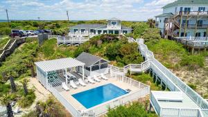 an aerial view of a house with a swimming pool at All About Bubbles in Indian Beach