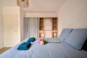 Postel nebo postele na pokoji v ubytování Maison moderne avec jardin sans vis-à-vis, idéal professionnels et familles