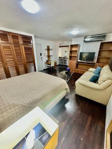 TV a/nebo společenská místnost v ubytování Suite Ejecutiva full equipo en Los Palos Grandes