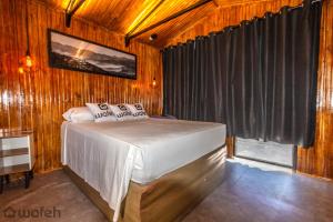 Postel nebo postele na pokoji v ubytování Wafeh Pampulha Suítes + 29 fotografií