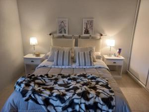 Postel nebo postele na pokoji v ubytování Atardecer de San Benito