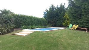 Bazén v ubytování Atardecer de San Benito nebo v jeho okolí + 10 fotografií