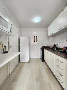 Køkken eller tekøkken på Apartamento de 2 quartos Completo
