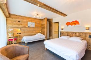 Ένα ή περισσότερα κρεβάτια σε δωμάτιο στο Accueil Savoyard