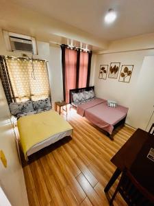 Katil atau katil-katil dalam bilik di JFam Suites, C2-5F 1BR , Up To 7 Pax