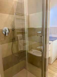 a shower with a glass door in a bathroom at ARTs at Portovenere in Portovenere +16 photos
