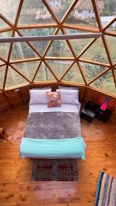 Ένα ή περισσότερα κρεβάτια σε δωμάτιο στο Glamping Brillo de Luna +28 φωτογραφίες