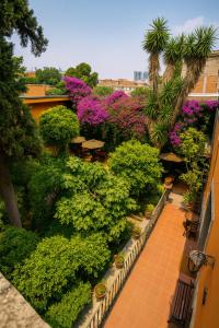 an overhead view of a garden with plants and trees at Hacienda Gobernadores Boutique Stay in a Historic 19th-Century Hacienda in Mexico City