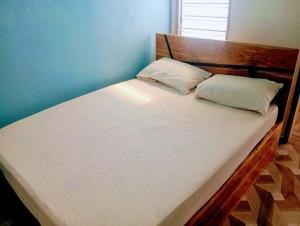 Ένα ή περισσότερα κρεβάτια σε δωμάτιο στο Mag home suite