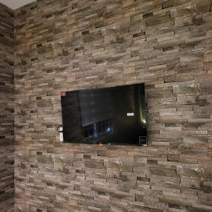 Μια τηλεόραση ή/και κέντρο ψυχαγωγίας στο NP Luxury Motel +18 φωτογραφίες